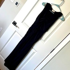 Long maxi slit on side and small opening at the front. Ruched in front and sides